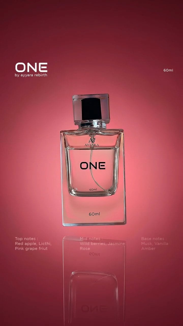 A clear bottle of ONE by Ayyara Rebirth, 60 ml, against a deep rose background